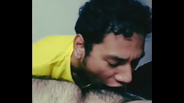 Enjoying this hairy male's delicious cock with blowjobs.